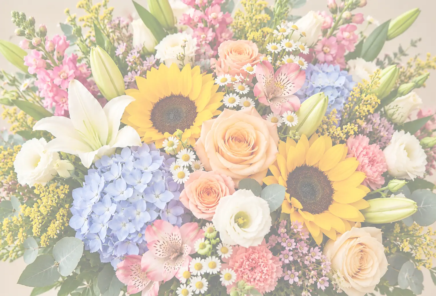 Colorful bouquet of sunflowers, peach roses, white lilies, blue hydrangeas, and pink flowers in Essex, Connecticut